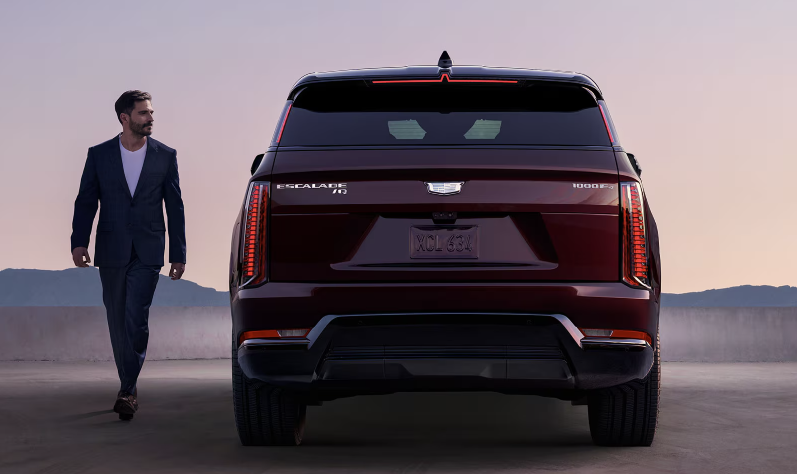 backend of a purple ESCALADE IQ model with talent